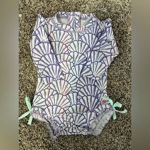 RuffleButts Baby Girls One Piece Rash Guard Swimsuit